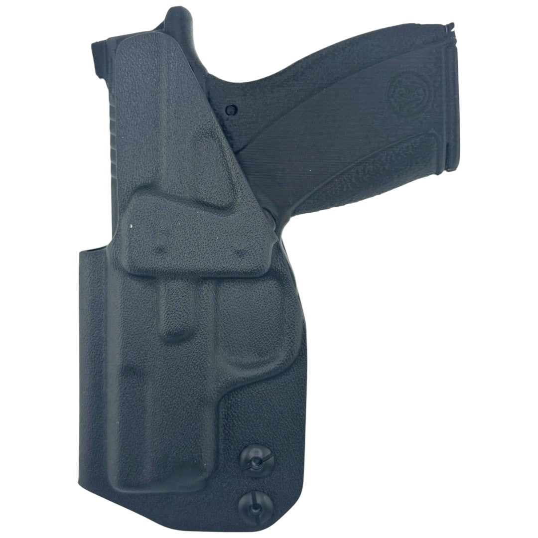 Black gun holster with a gun inside on a white background