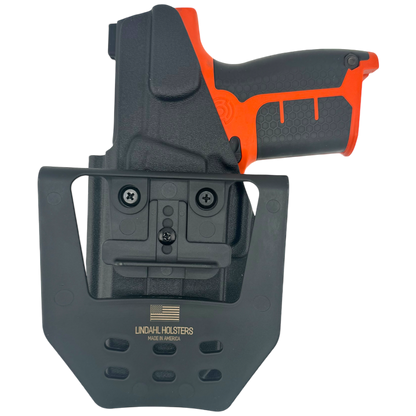 Black and orange gun holster with Lindahl Holsters branding on a white background