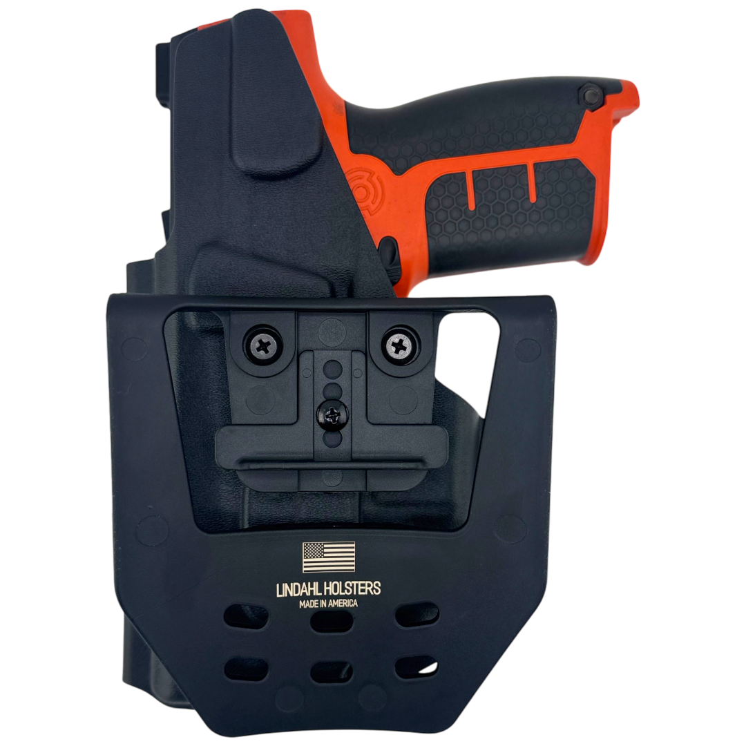 Black and orange gun holster with visible brand logo on a white background