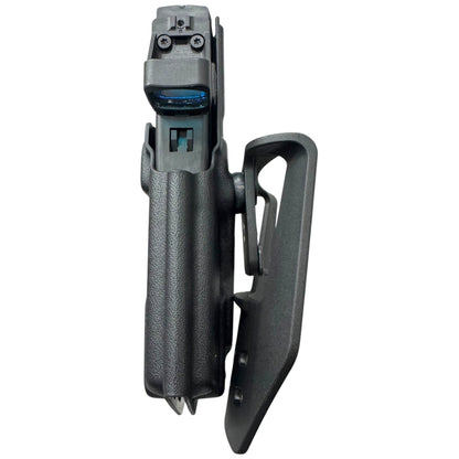 A black textured holster with an attached black plastic clip and a mounted device at the top, shown against a plain white background.