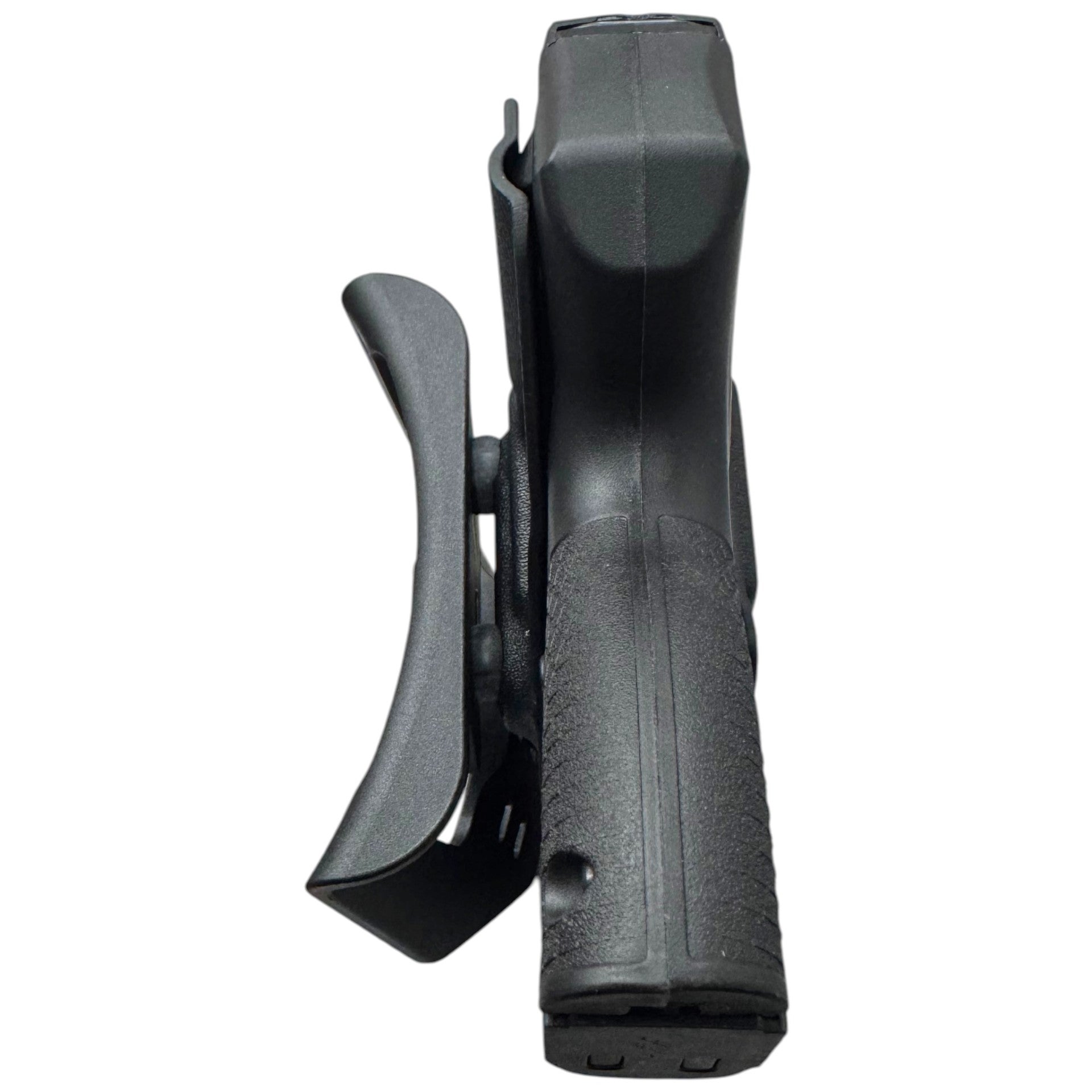 A black polymer belt holster shown from a side profile view, containing a handgun grip, on a solid white background.