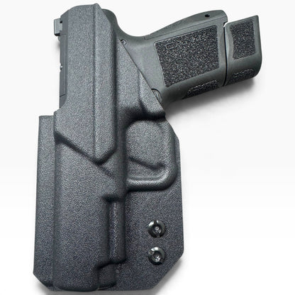 CANIK METE MC9 LS FIREARM INSIDE A BLACK IWB LINDAHL HOLSTER.