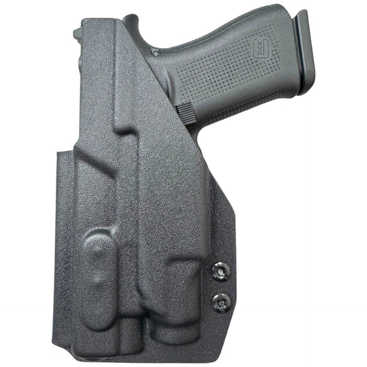 Black gun holster with a gun inside on a white background