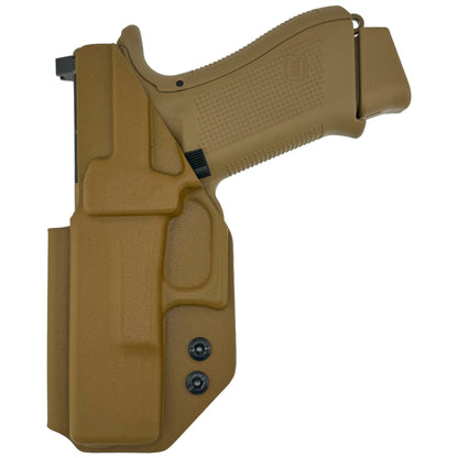 Coyote Tan Kydex inside-waistband holster fitted on a Glock-style pistol, shown on a white background with adjustable retention screws visible.