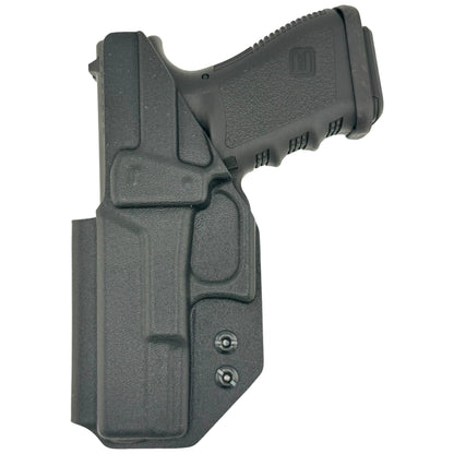 DARK GREY Kydex® inside-waistband holster fitted on a Glock-style pistol, shown on a white background with adjustable retention screws visible.