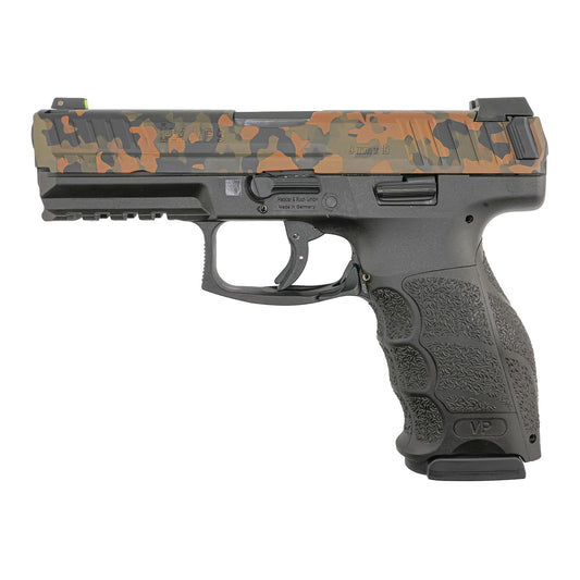 H&K VP9 FIREARM WITH A CAMO SLIDE ON A WHITE BACKGROUND.