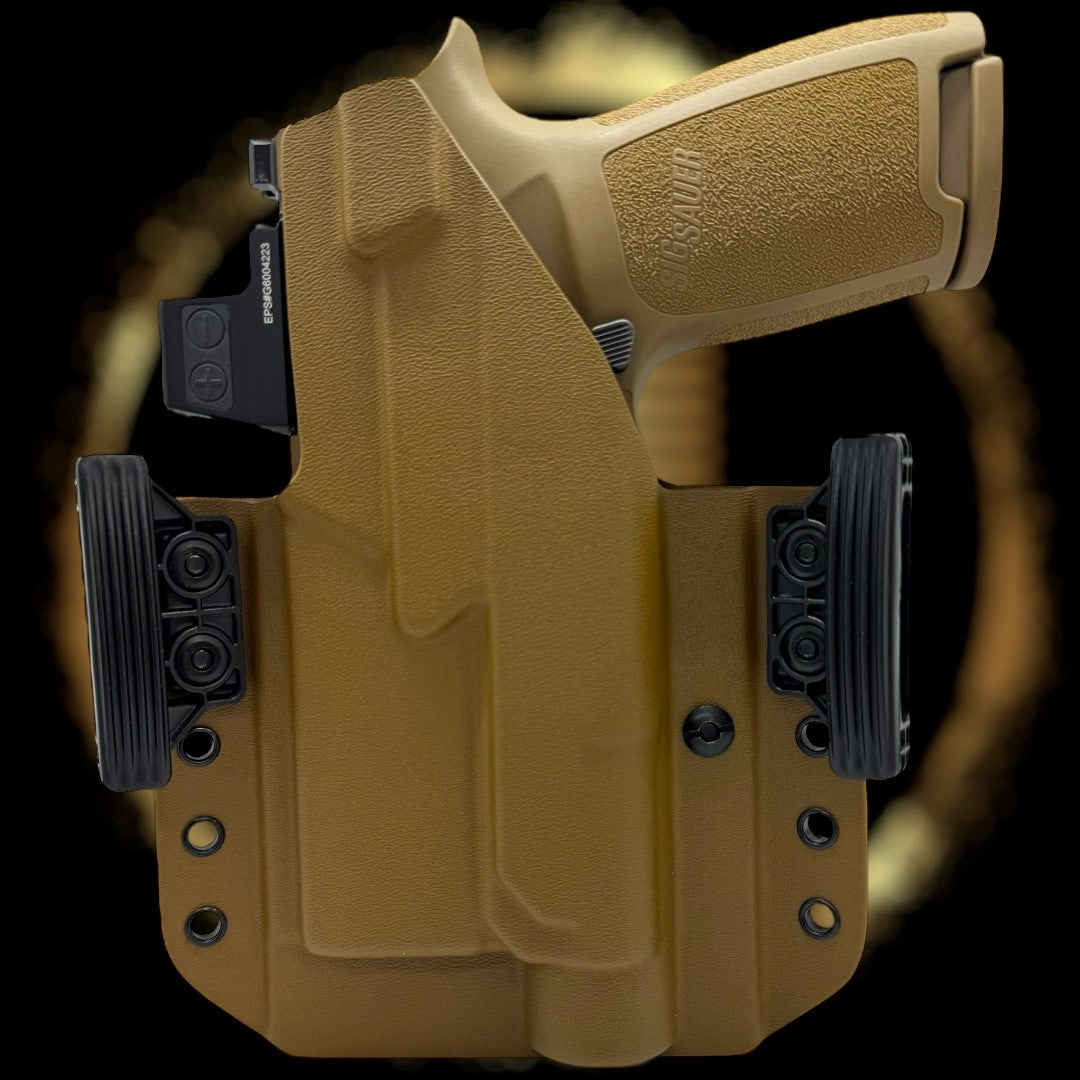 Tan holster with gun on a black background