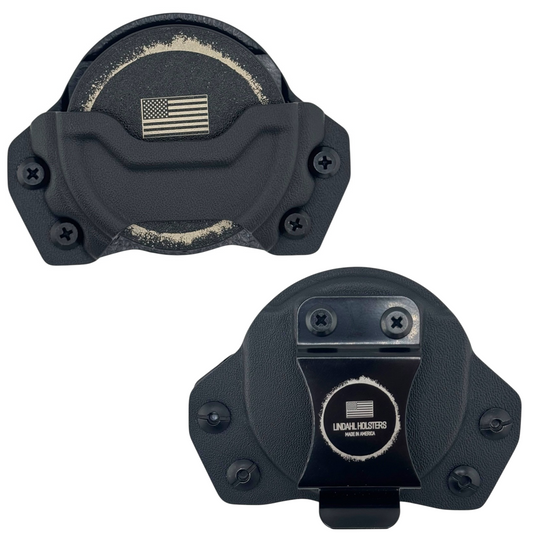 Two black tactical components with American flag emblem on a white background