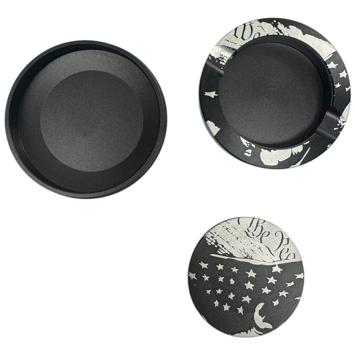 Set of three black and white patterned dishes on a white background