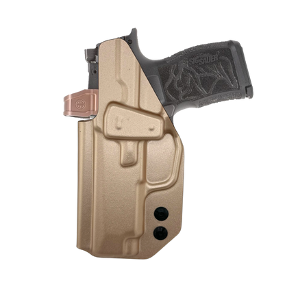 Rose Gold gun holster with black grip on a white background