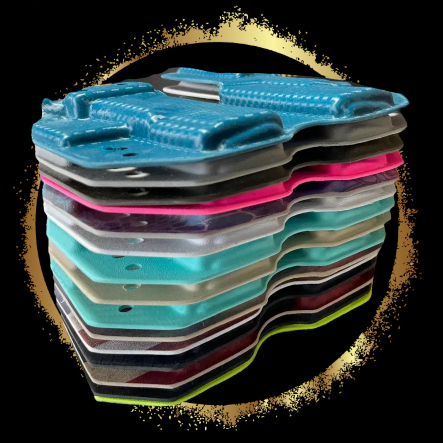 Stack of colorful plastic trays on a black background