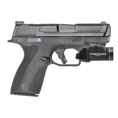 Black handgun with Streamlight flashlight attachment on a white background
