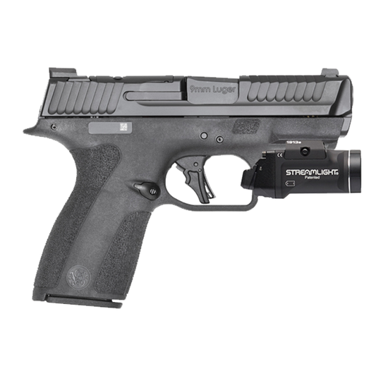 Black handgun with Streamlight flashlight attachment on a white background