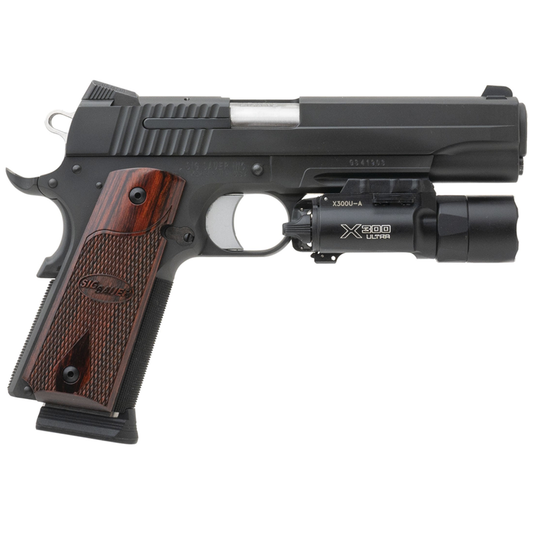 SIG SAUER 1911 FIREARM WITH A SUREFIRE X300 LIGHT ON A WHITE BACKGROUND.