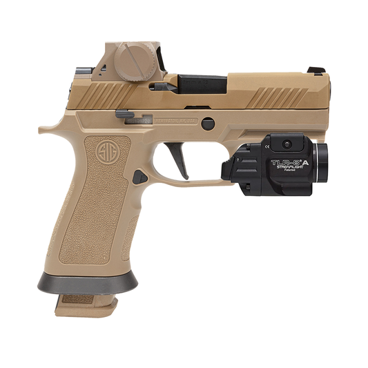 Tan handgun with a flashlight attachment on a white background