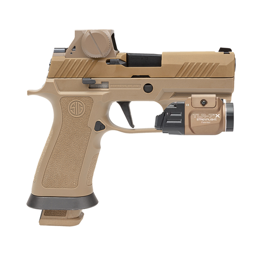 Tan handgun with flashlight attachment on a white background