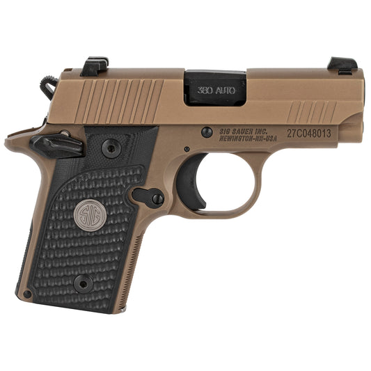 Tan and black handgun on a white background