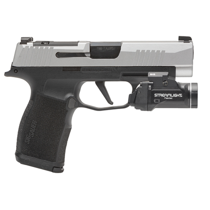 Handgun with a Streamlight flashlight attachment on a white background